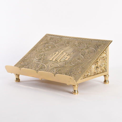 Ornamented Solid Brass IHS Missal Stand This solid brass fixed position missal stand is covered in heavy ornamentation for a wonderful altar detail.